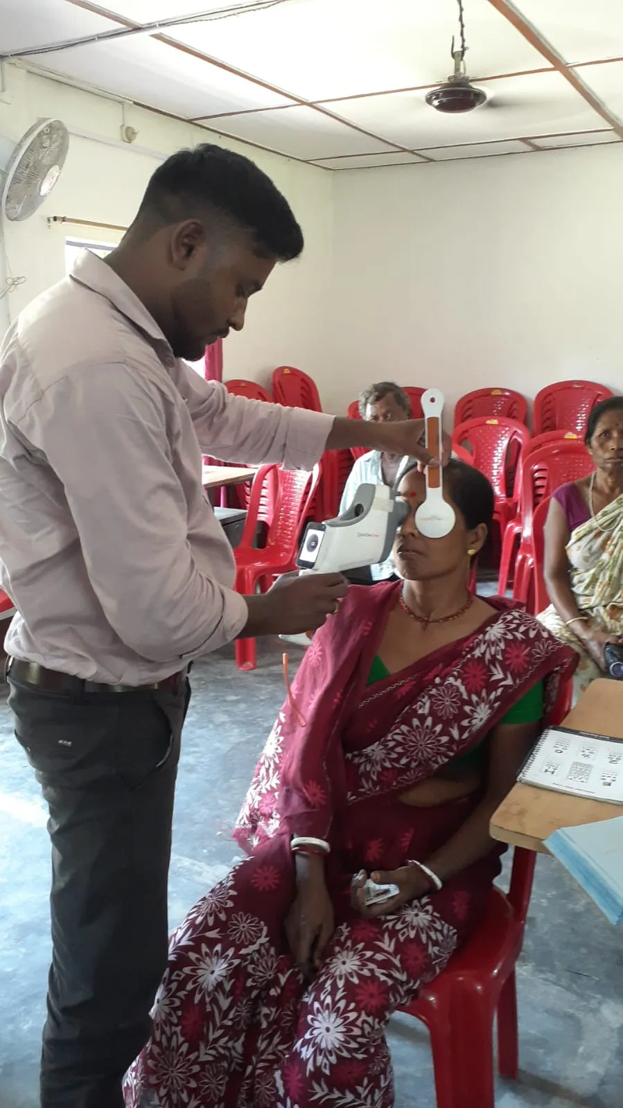 Patient counseling desk for vision care beneficiaries.